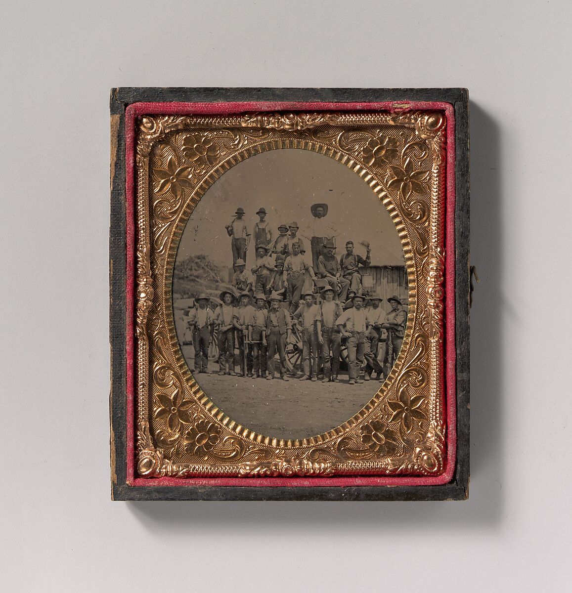 [Crew of Twenty-one Workmen Posing With Tools Outdoors], Unknown (American), Tintype 