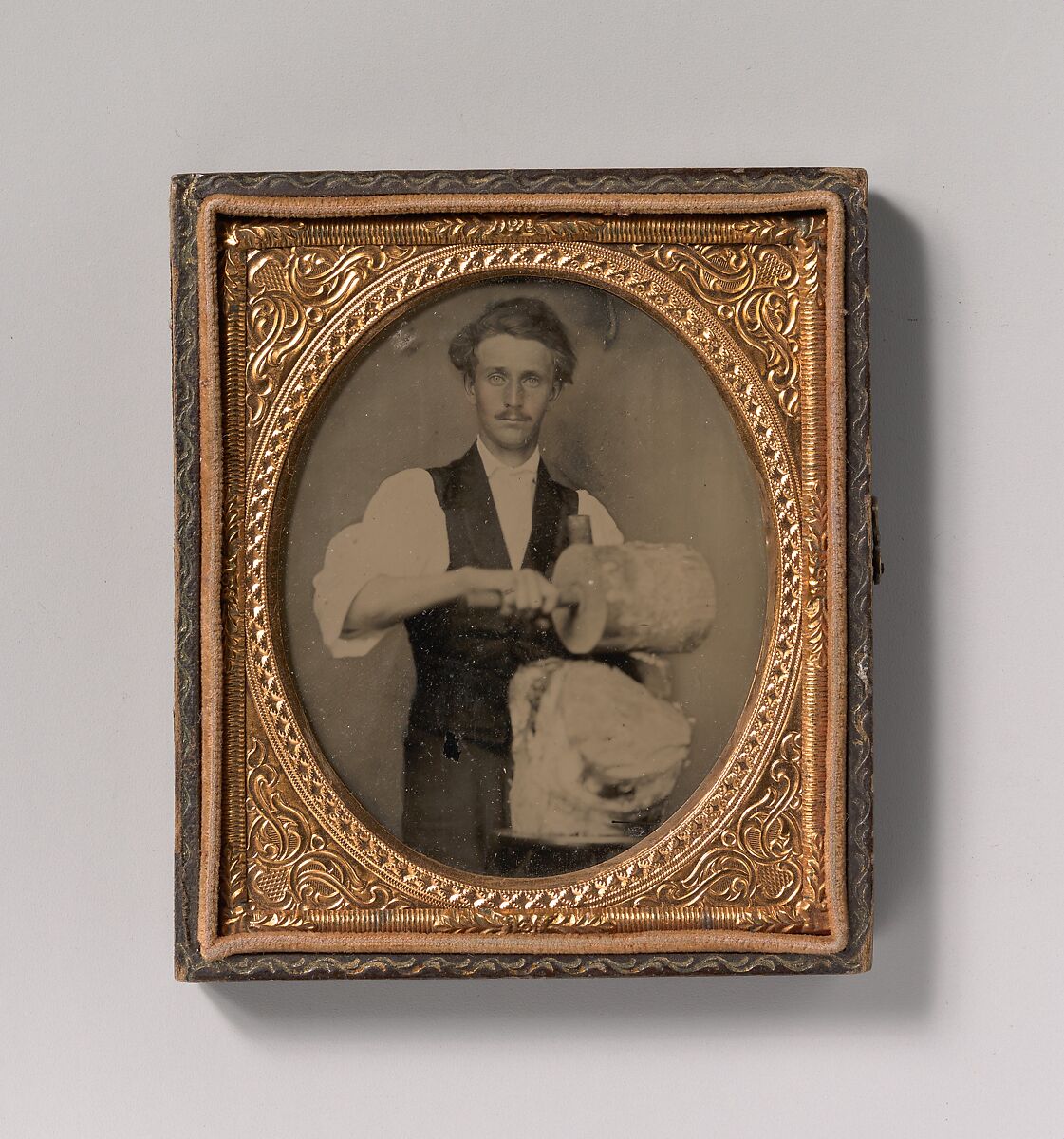 [Man Riving Wood with Froe and Club], Unknown (American), Ambrotype with applied color 