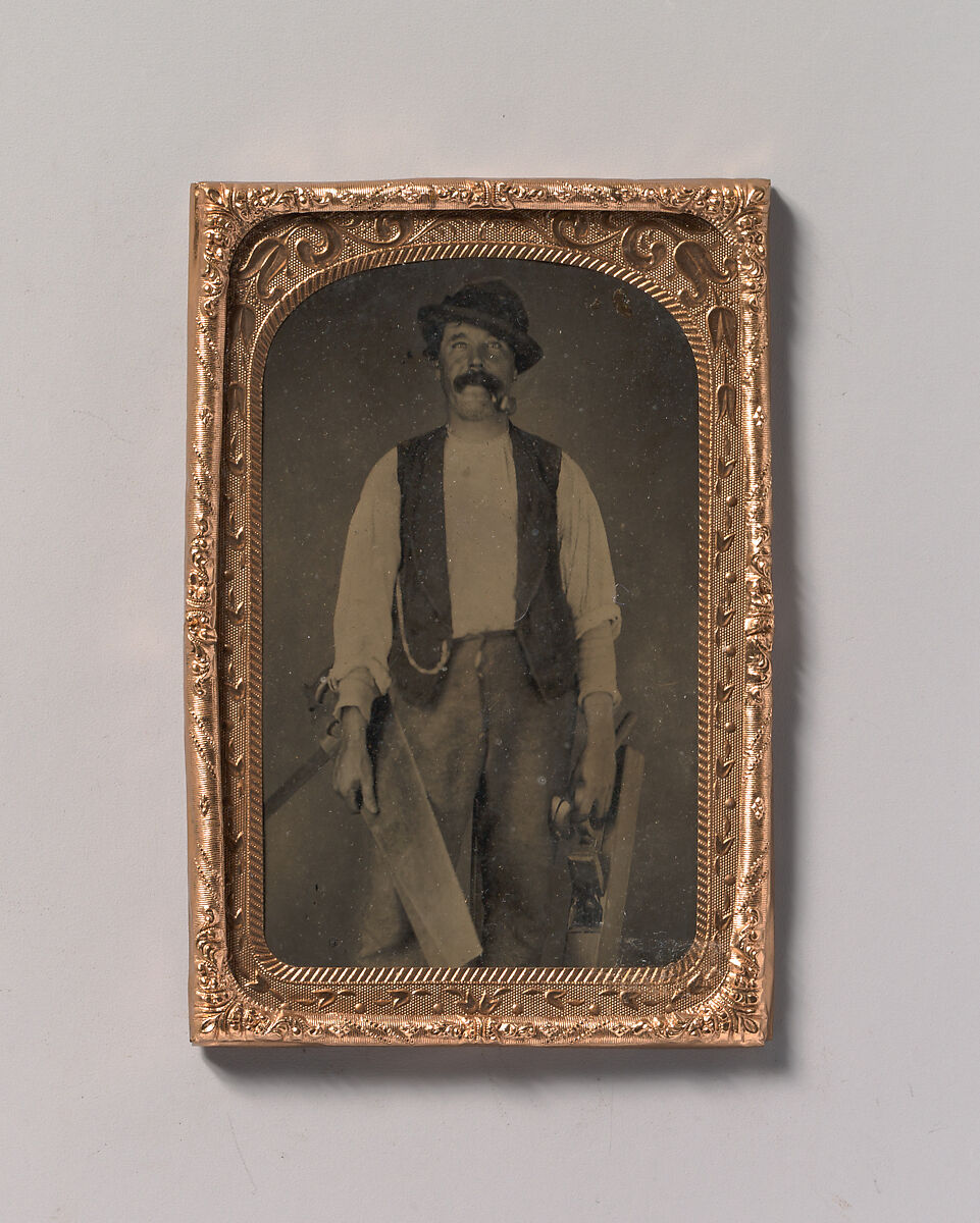 [Carpenter with Saw, Hammer, and Jointer], Unknown (American), Tintype 