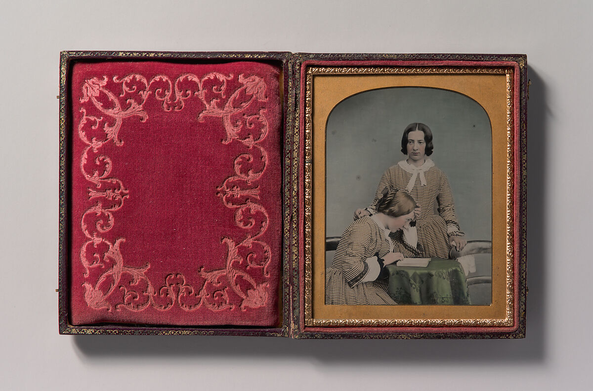 [Two Women Wearing Striped Dresses, One Standing, the Other Seated], Unknown (British), Ambrotype with applied color 