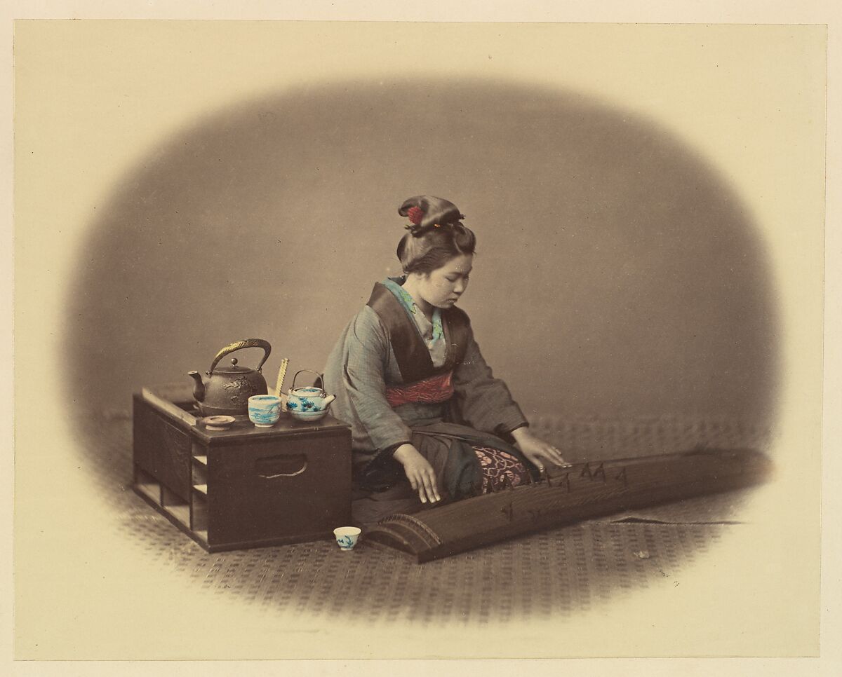 [Woman with Tea Set Playing the Koto], Felice Beato (British (born Italy), Venice 1832–1909 Luxor), Albumen silver print from glass negative with applied color 