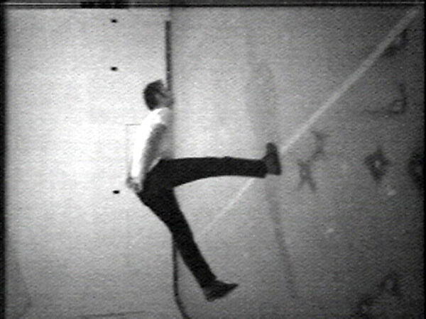 Slow Angle Walk (Beckett Walk), Bruce Nauman  American, Single-channel digital video, transferred from video tape, black-and-white, sound, 60 min.