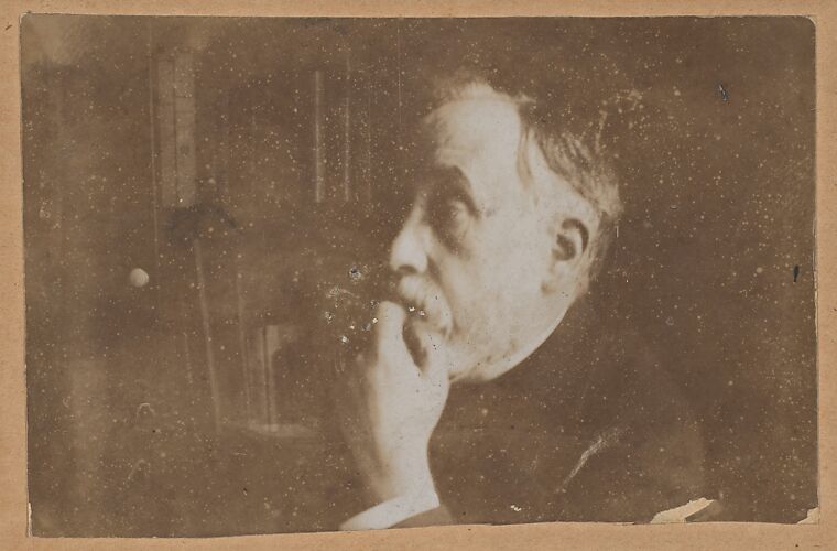 [Self-Portrait in Library (Hand to Chin)]