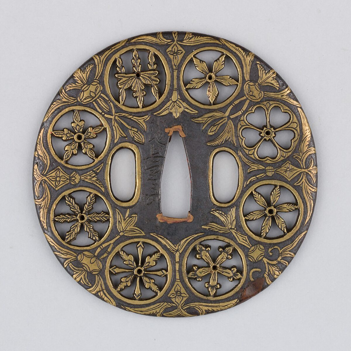 Sword guard (<i>Tsuba</i>) Depicting Crests and Arabesques (家紋散唐草文鐔), Koike Izumi no Kami Naomasa (Japanese, active late 16th–early 17th century), Iron, brass, copper, Japanese 