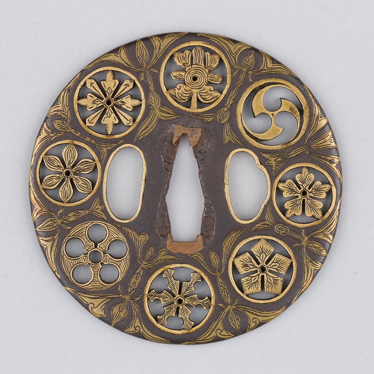 Sword guard (<i>Tsuba</i>) Depicting Crests and Arabesques (家紋散唐草文鐔), Koike Izumi no Kami Naomasa (Japanese, active late 16th–early 17th century), Iron, brass, copper, Japanese