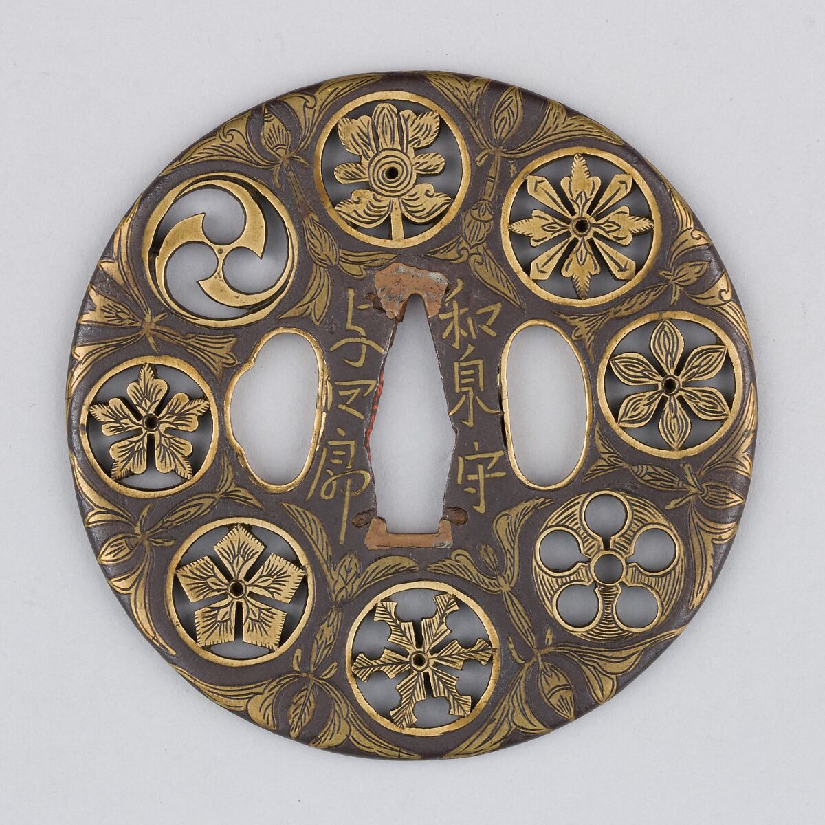 Sword guard (<i>Tsuba</i>) Depicting Crests and Arabesques (家紋散唐草文鐔), Koike Izumi no Kami Naomasa (Japanese, active late 16th–early 17th century), Iron, brass, copper, Japanese 