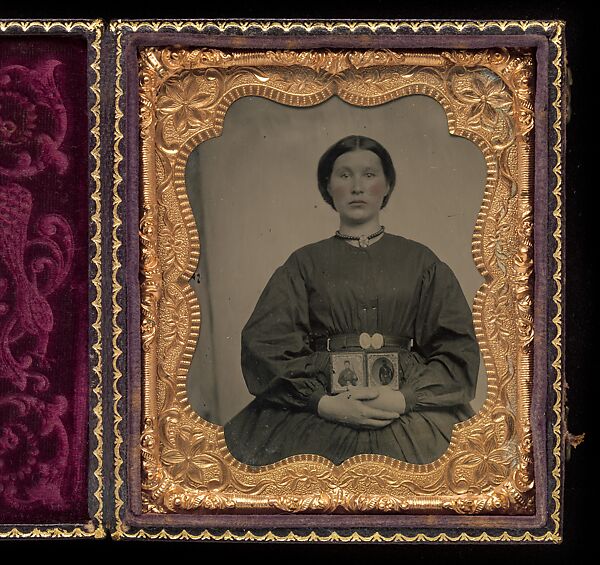 [Woman Holding Cased Portraits of Civil War Soldiers], Unknown, Tintype