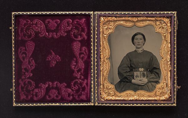 [Woman Holding Cased Portraits of Civil War Soldiers], Unknown, Tintype 
