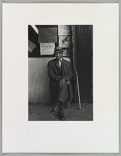 [Man at 116th Street and Lenox Avenue]