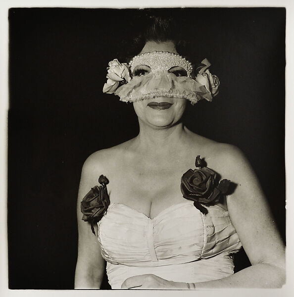Lady at a masked ball with two roses on her dress N.Y.C., Diane Arbus (American, New York 1923–1971 New York), Gelatin silver print 