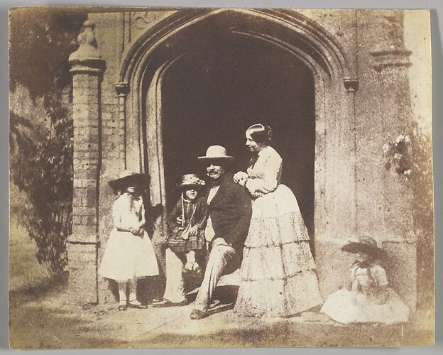 Family Group Portrait Posed in Doorway