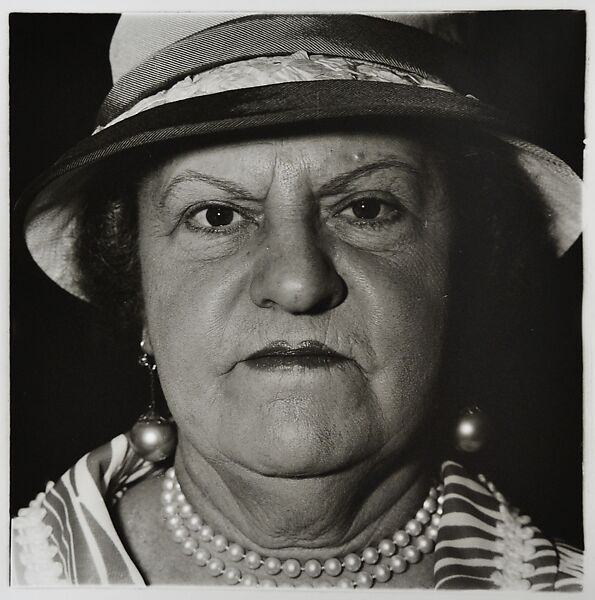 A woman with pearl necklace and earrings, N.Y.C, Diane Arbus (American, New York 1923–1971 New York), Gelatin silver print 
