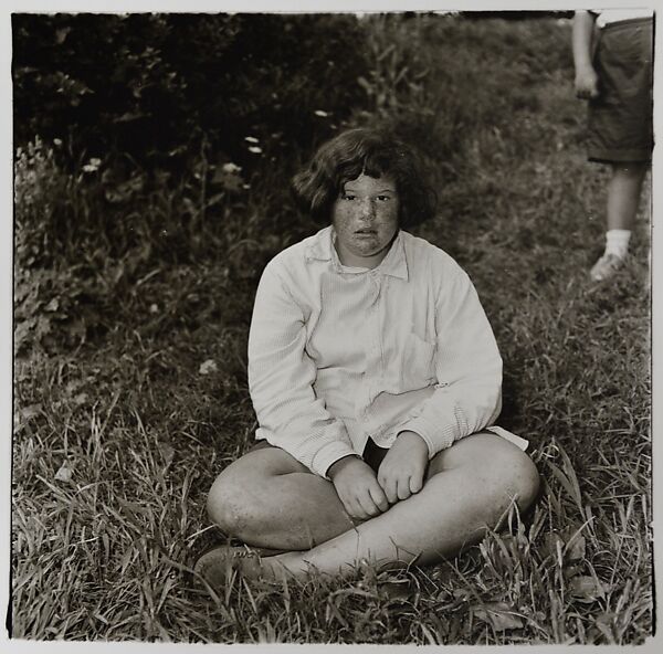 Girl sitting in the grass at Camp Lakecrest, Dutchess County, N.Y., Diane Arbus (American, New York 1923–1971 New York), Gelatin silver print 