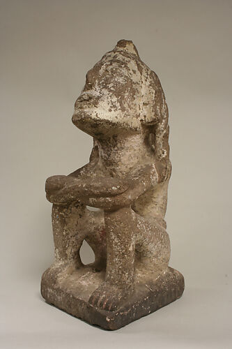 Seated Male Deity (?)