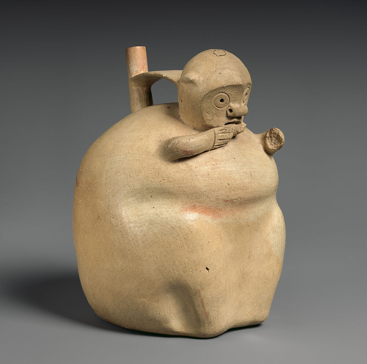 Monkey-shaped spout-and-bridge bottle, Topará artist(s), Ceramic, slip, Topará