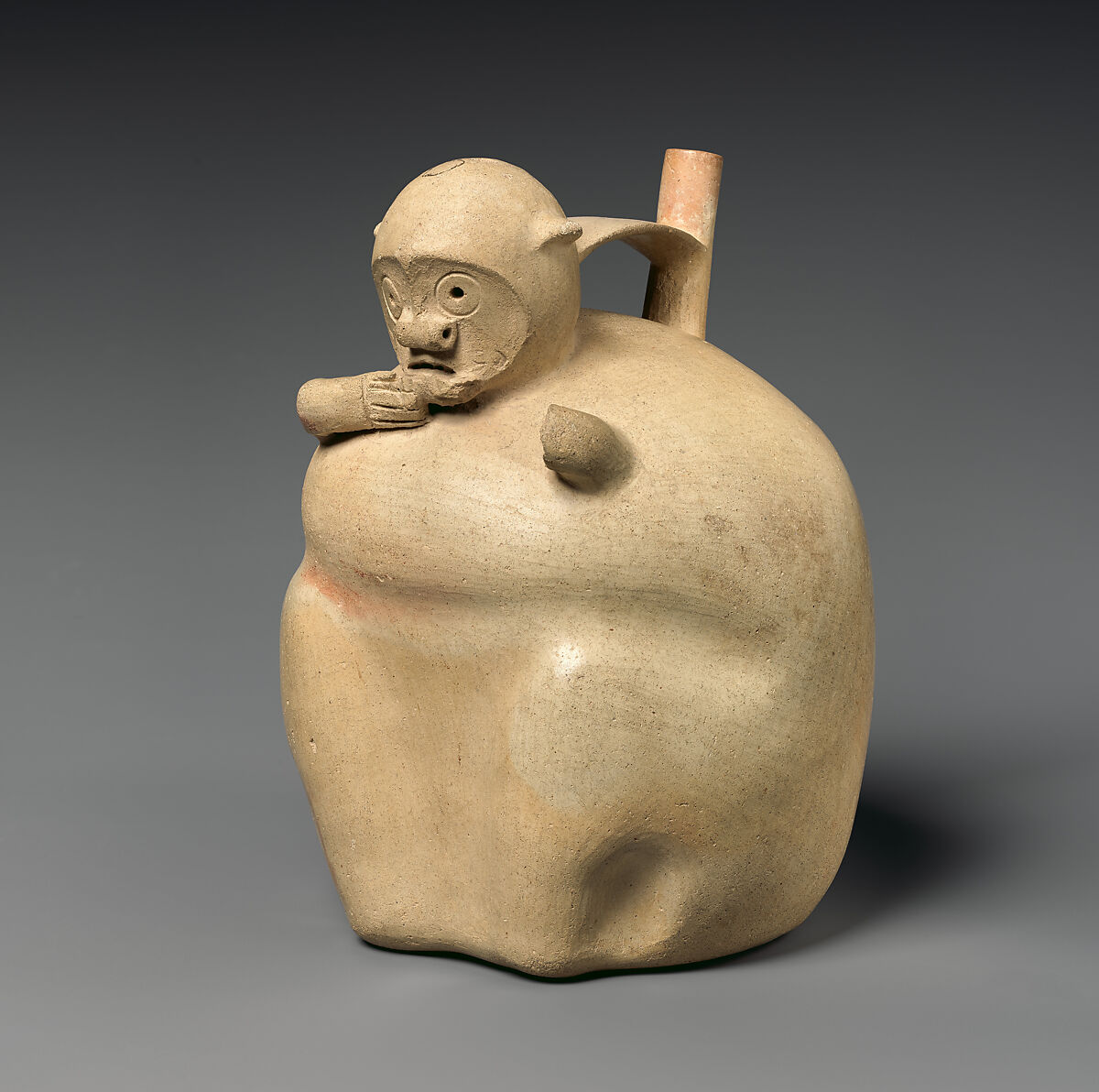 Monkey-shaped spout-and-bridge bottle, Topará artist(s), Ceramic, slip, Topará