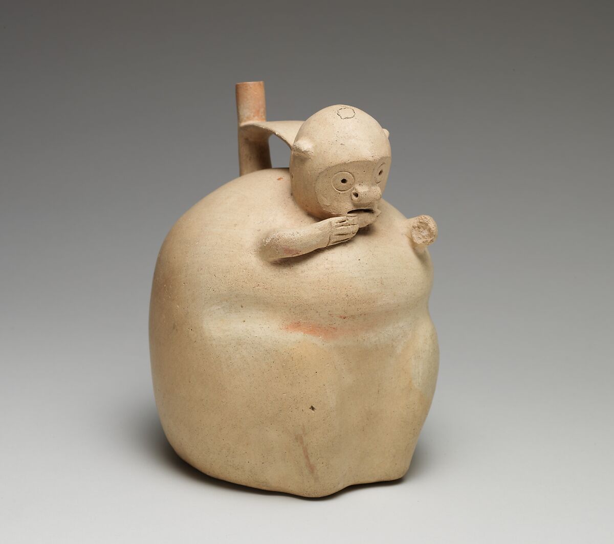 Monkey-shaped spout-and-bridge bottle, Topará artist(s), Ceramic, slip, Topará 