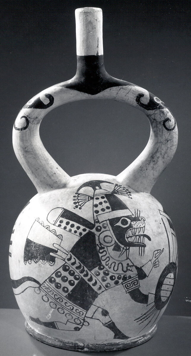 Stirrup spout bottle with fox warrior figure, Ceramic, pigment, Moche