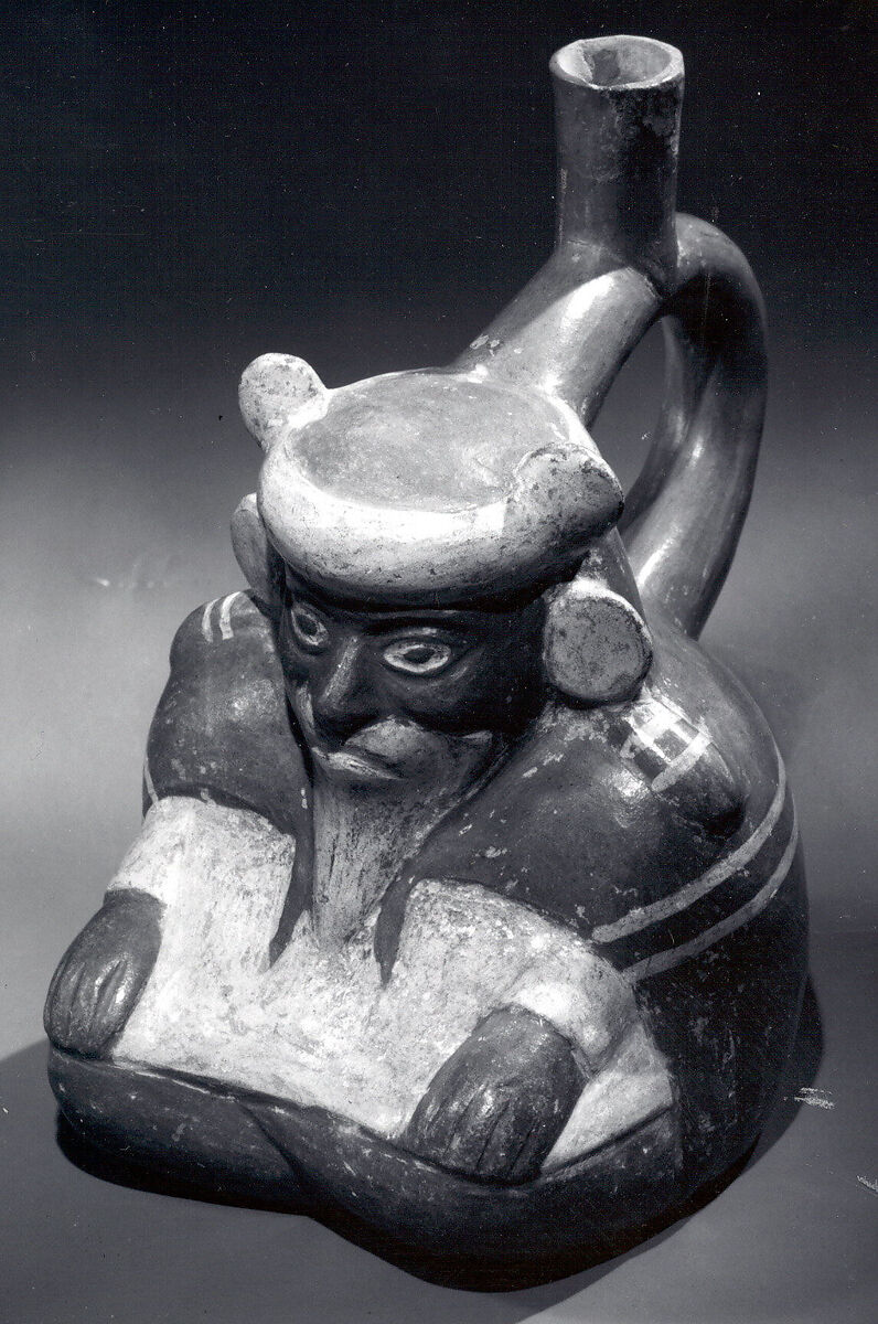 Stirrup spout bottle with sitting figure, Ceramic, pigment, Moche
