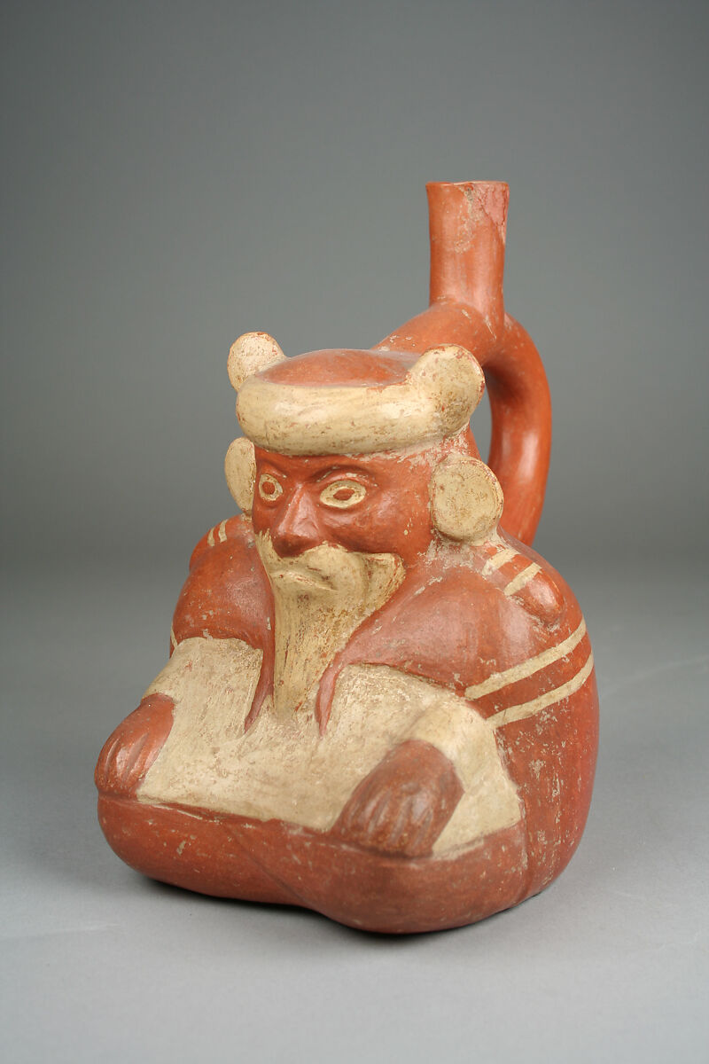 Stirrup spout bottle with sitting figure, Ceramic, pigment, Moche 