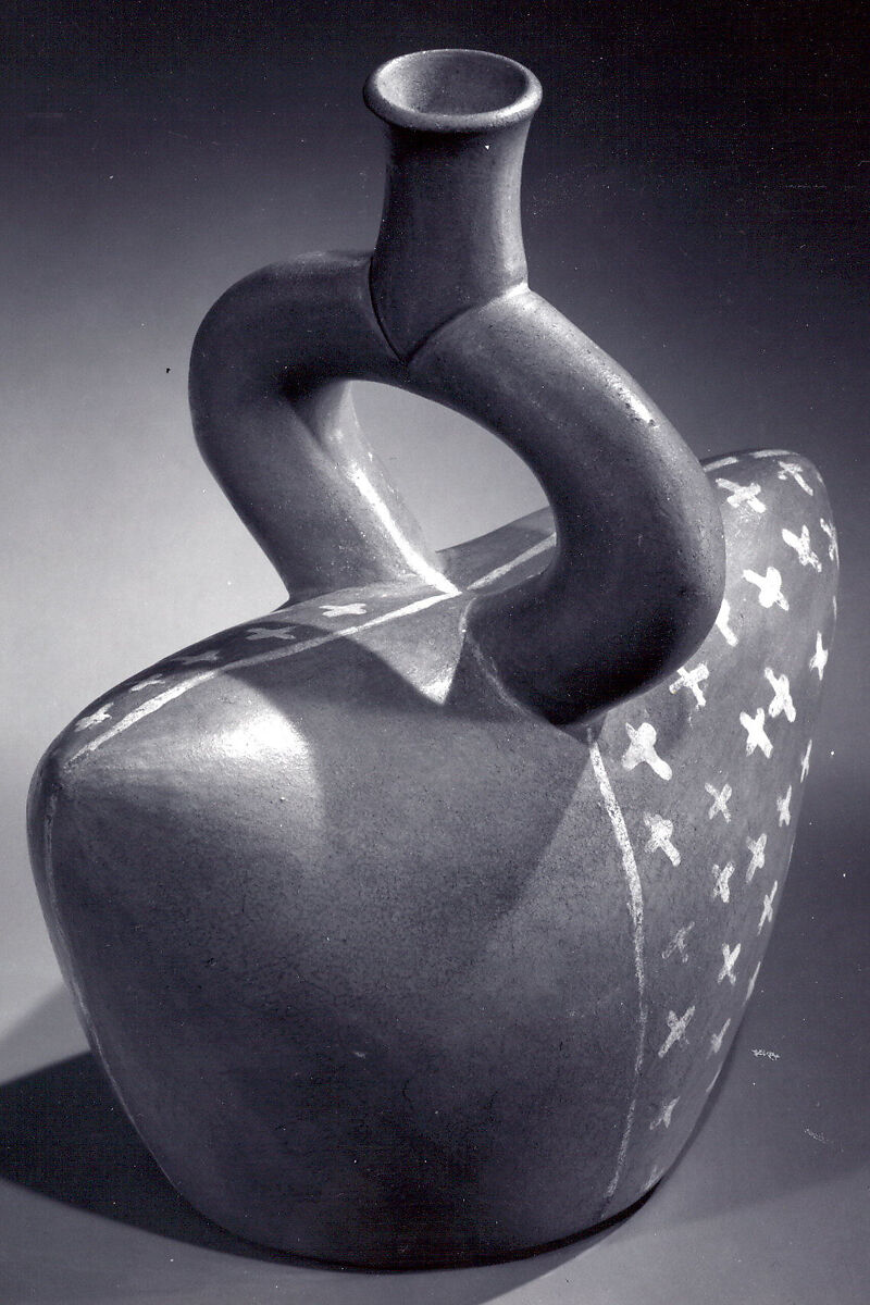 Stirrup spout bottle in cap shape, Ceramic, Moche or Salinar (?)