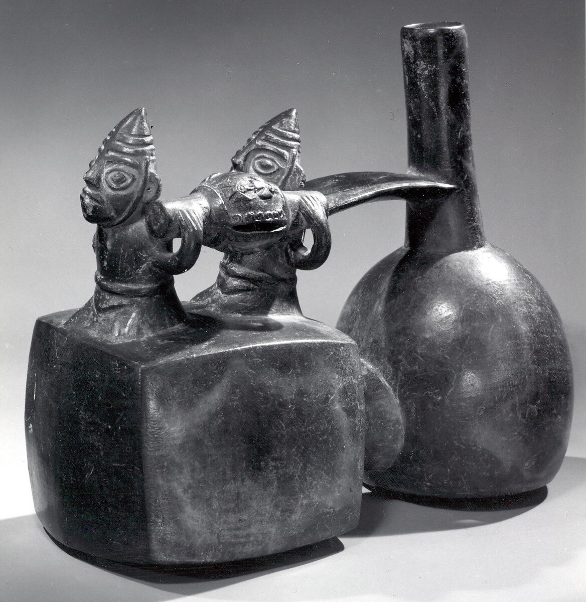 Spout-and-bridge bottle with funerary procession, Chimú artist(s), Ceramic, Chimú