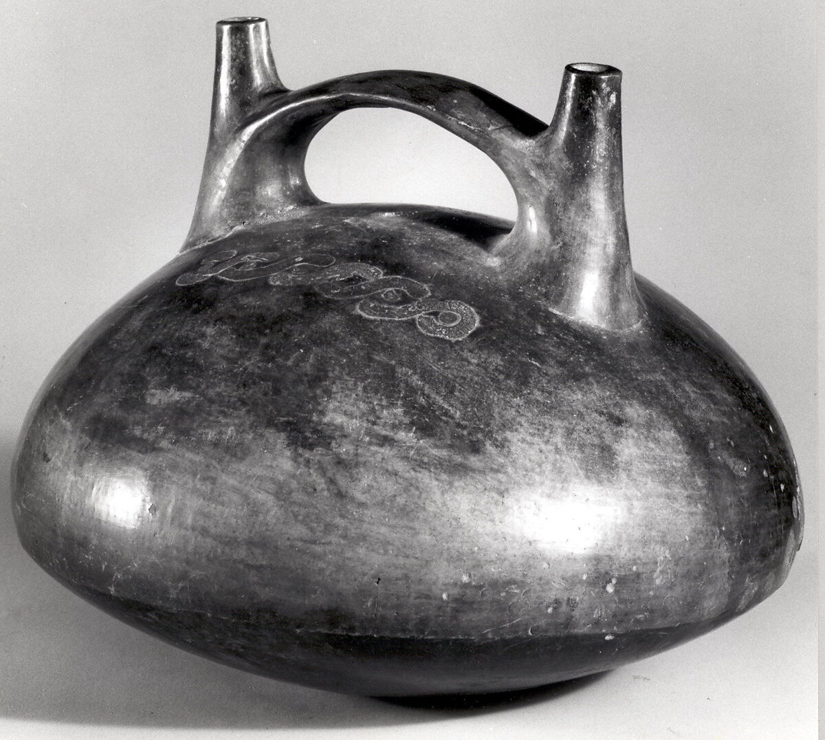 Bridge and Double Spout Bottle with Guilloches, Ceramic, Paracas