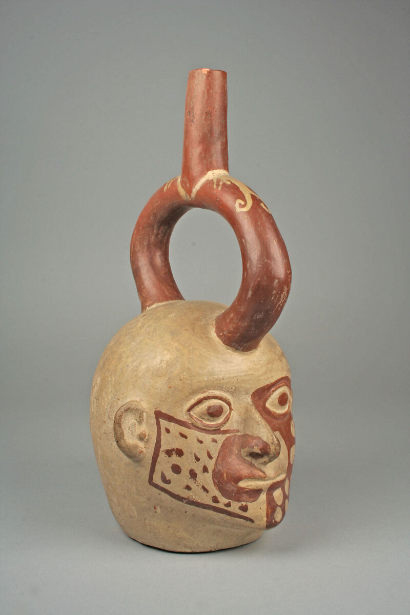 Stirrup Spout Bottle with Tattoed Head