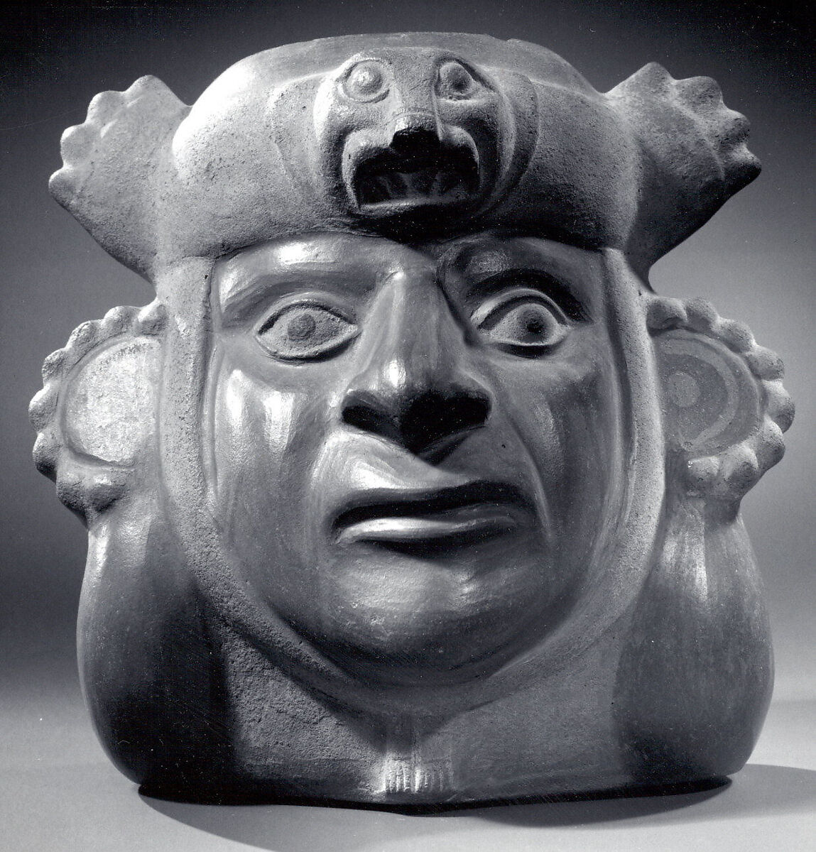 Stirrup Spout Bottle with Portrait Head, Ceramic, slip, pigment, Moche