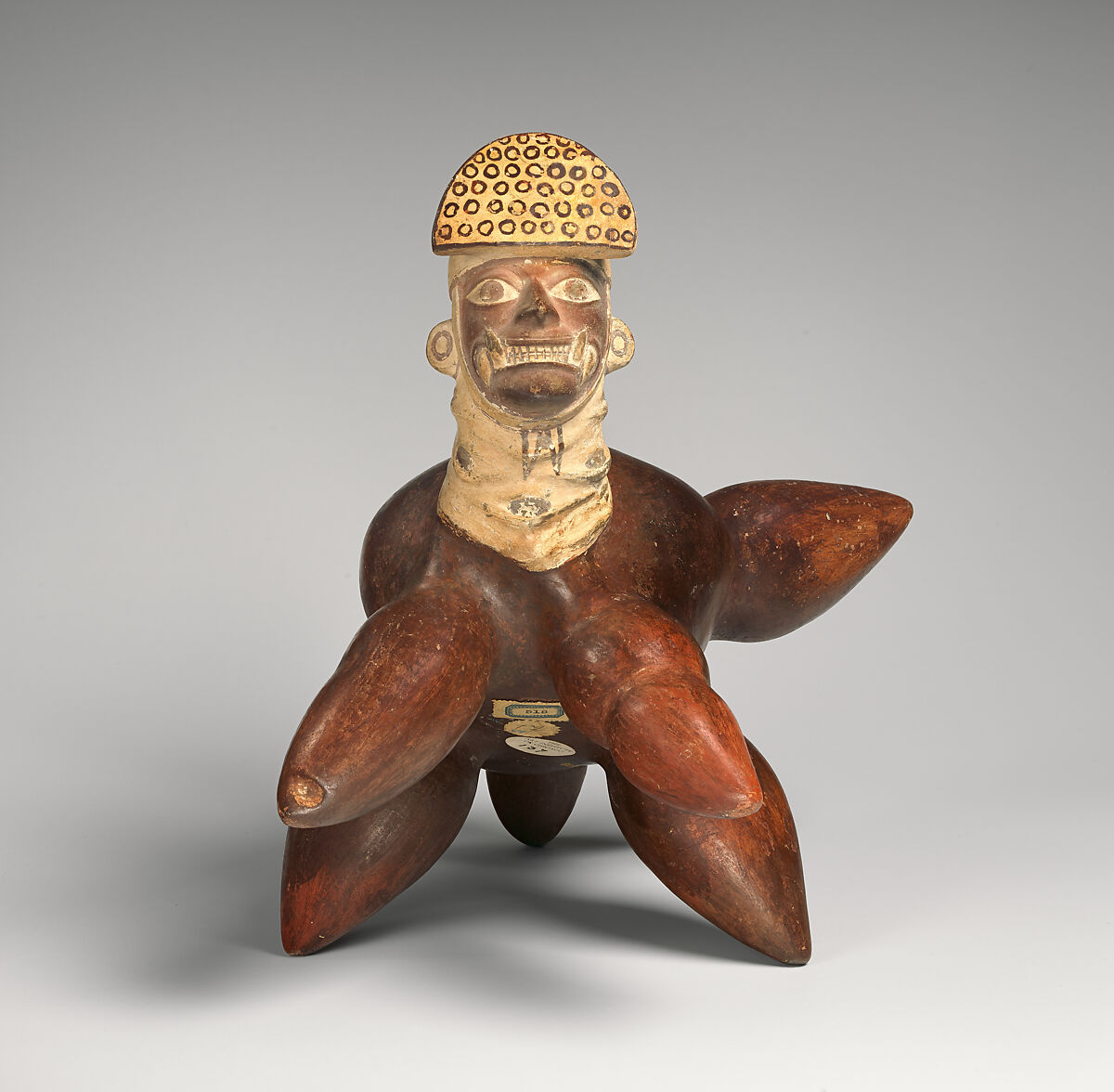 Tuber-inspired stirrup-spout bottle, Moche artist(s), Ceramic, slip, Moche