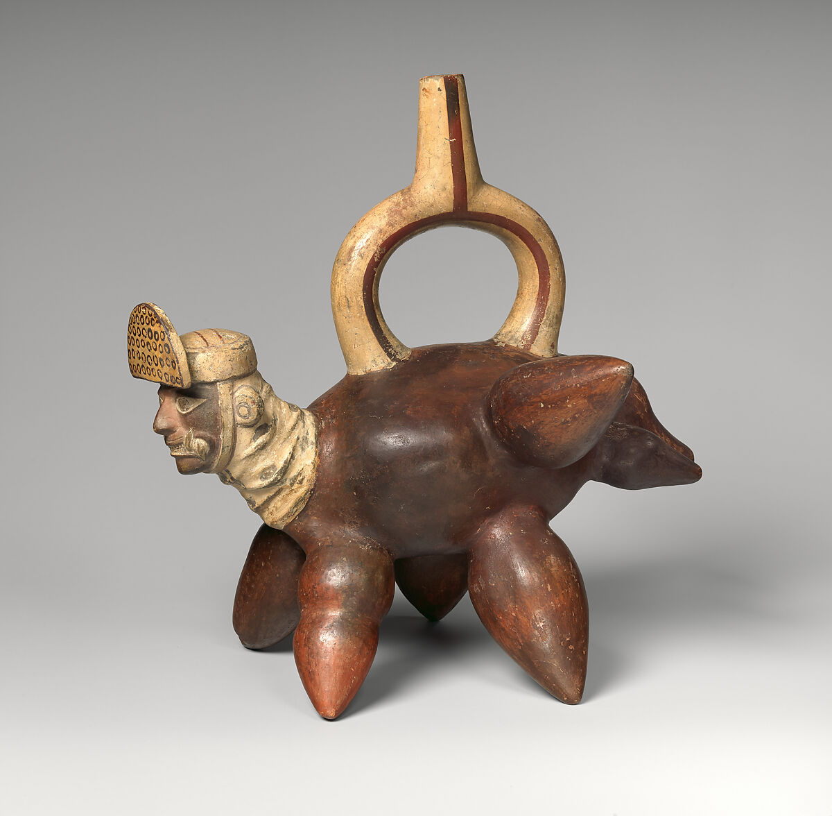 Tuber-inspired stirrup-spout bottle, Moche artist(s), Ceramic, slip, Moche