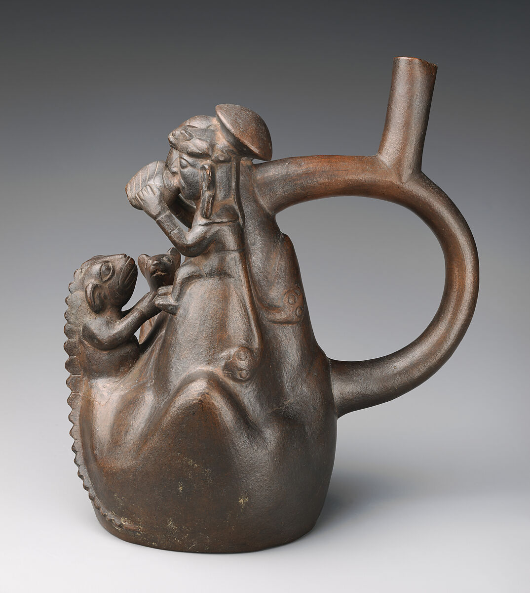 Stirrup-spout bottle with mountain sacrifice scene, Moche artist, Ceramic, slip, Moche