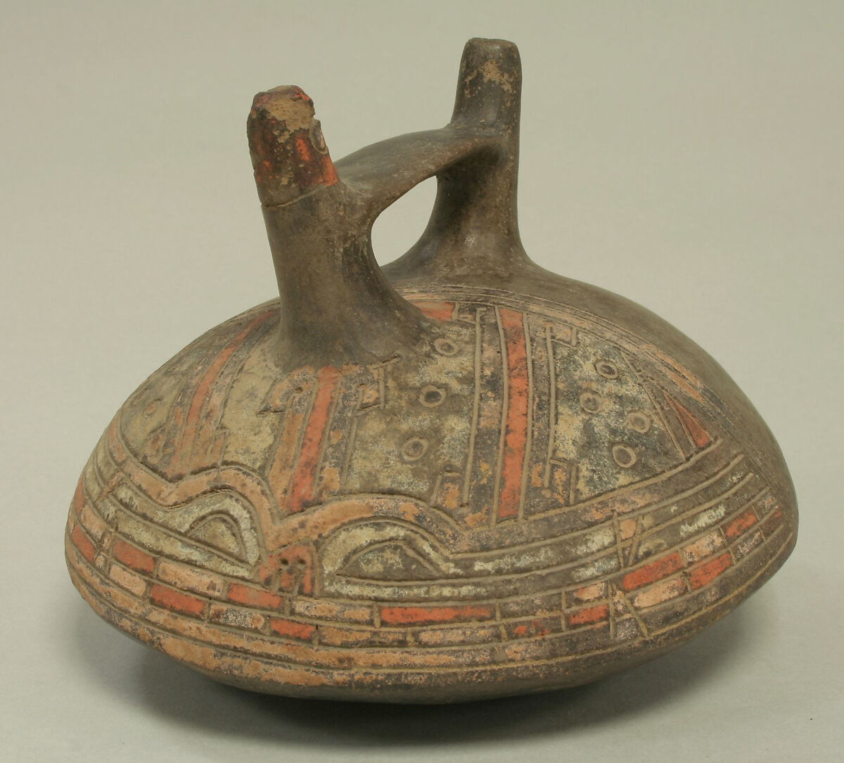 Double Spout and Bridge Bottle with Feline Face, Ceramic, pigment, Paracas 