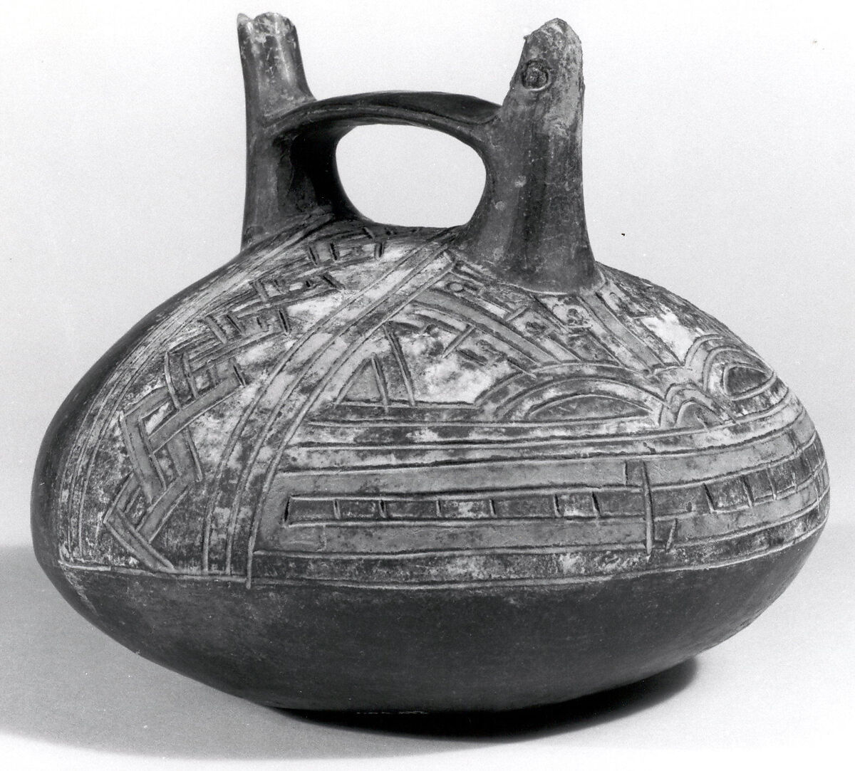 Double Spout and Bridge Bottle with Feline, Ceramic, pigment, Paracas