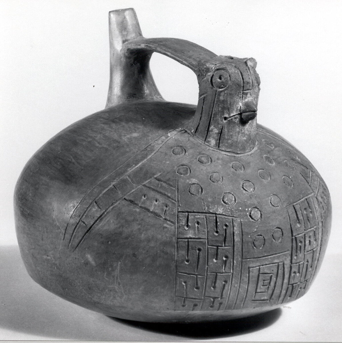 Double Spout and Bridge Bottle with Falcoln, Ceramic, slip, pigment, Paracas