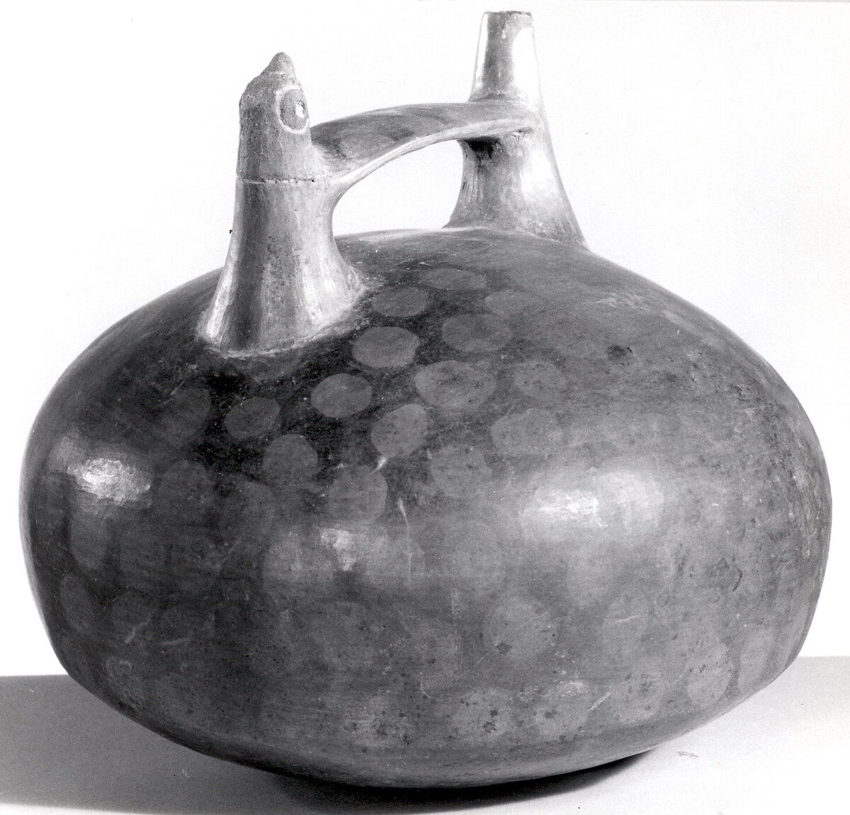 Double Spout and Bridge Bottle with Bird, Ceramic, pigment, Paracas