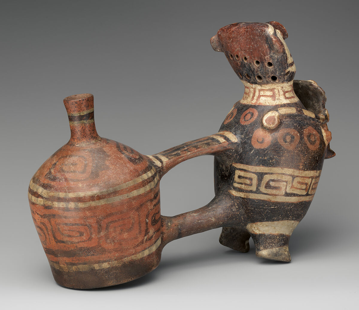 Double-chambered bottle with effigy figures, Vicús artist(s), Ceramic, pigment, Vicús