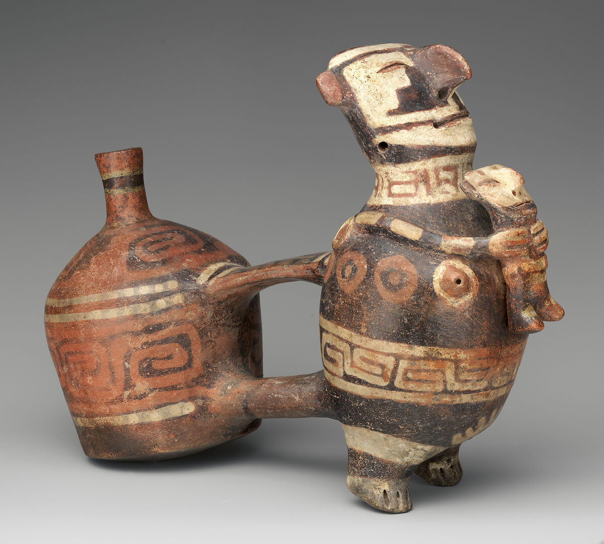 Double-chambered bottle with effigy figures, Vicús artist(s), Ceramic, pigment, Vicús