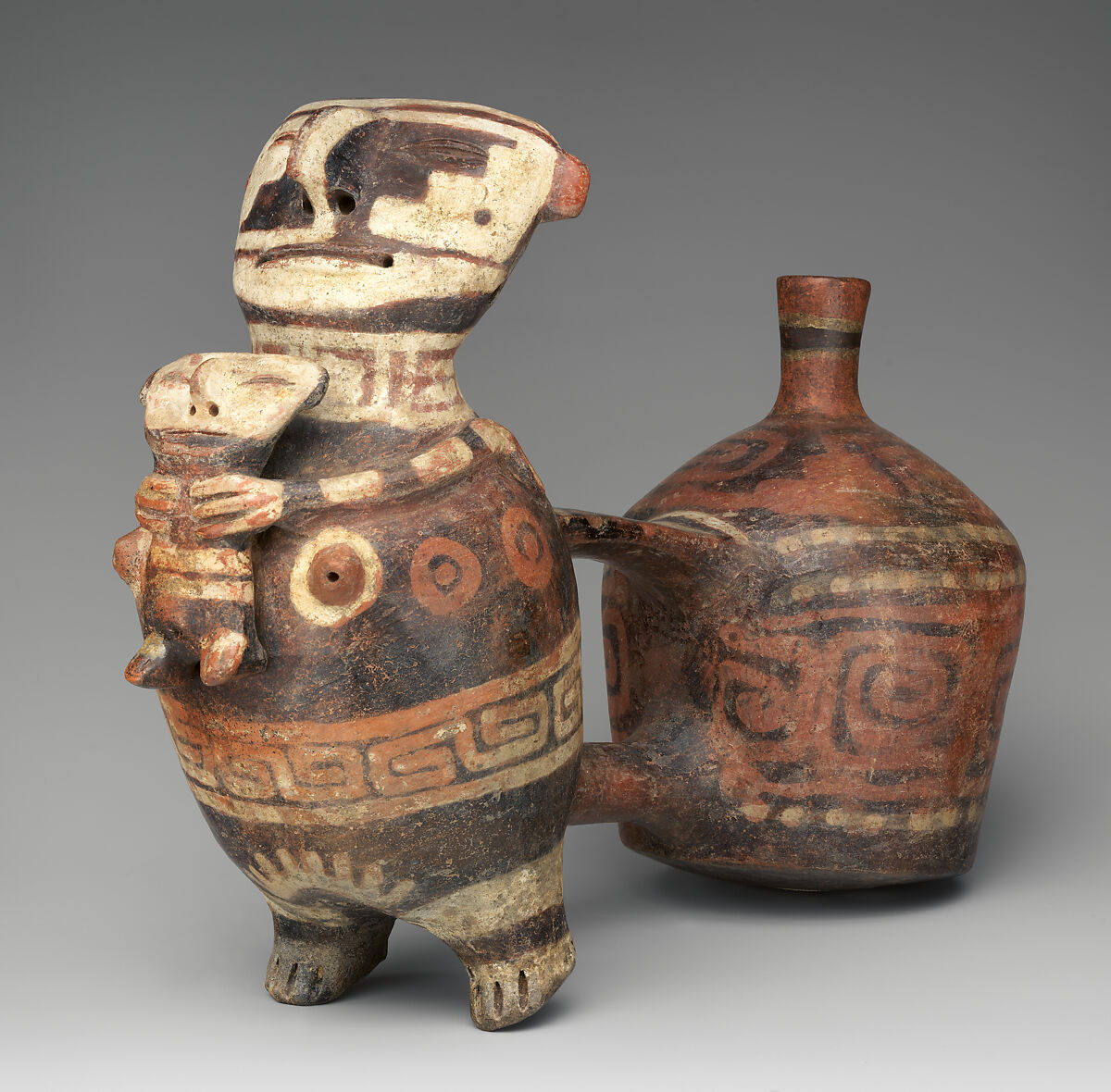 Double-chambered bottle with effigies figures, Vicús artist(s), Ceramic, pigment, Vicús