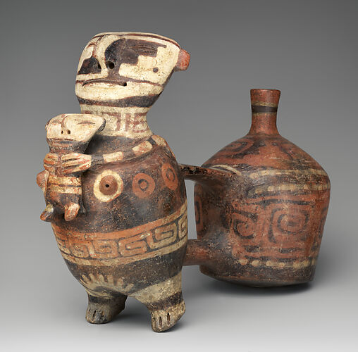 Double-chambered bottle with effigy figures