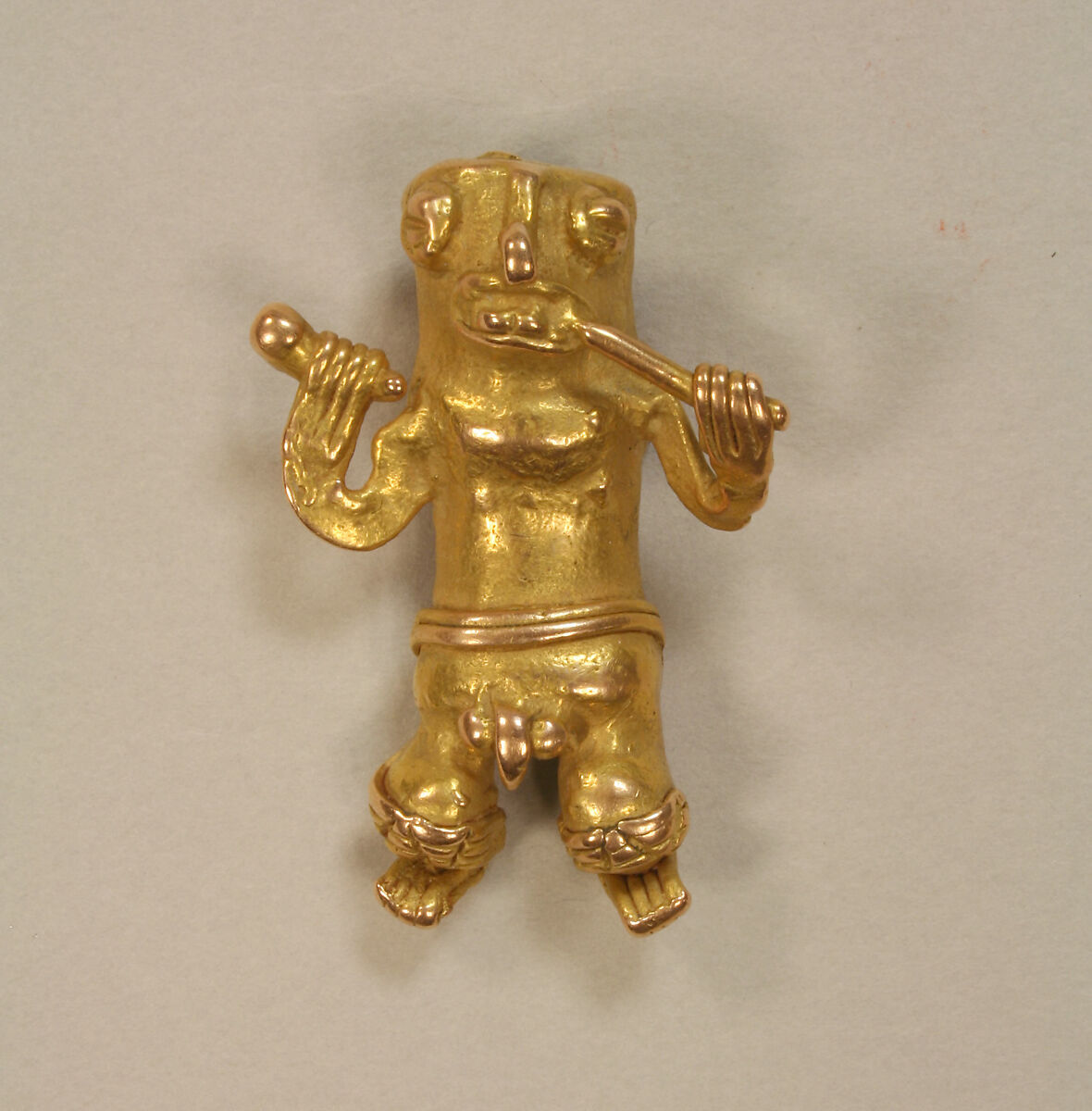 Cast Gold Pendant of Man with Flute, Gold (cast), Chiriqui (?) 