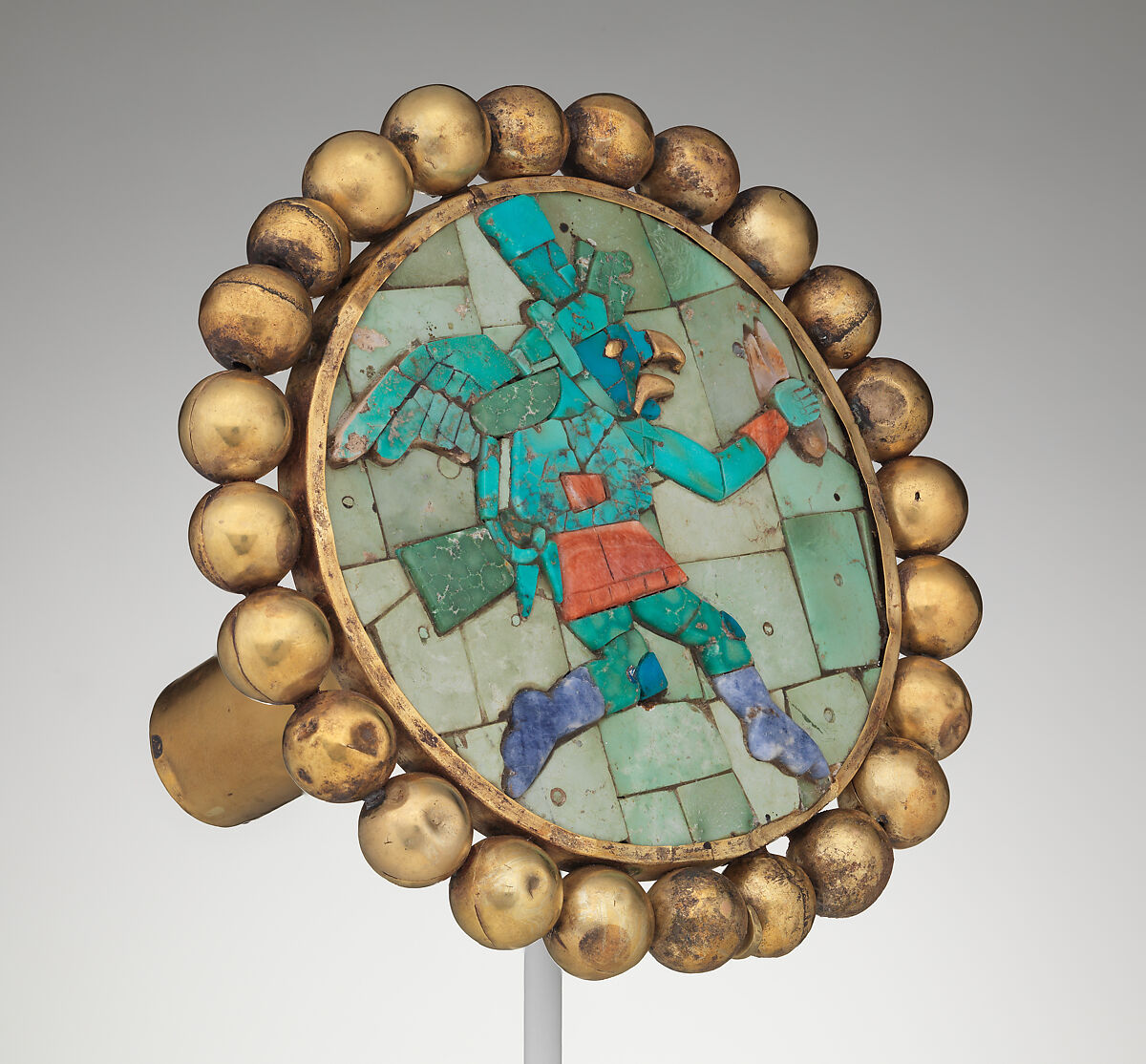 Ear ornament with winged runner, Moche artist(s), Gold, turquoise, sodalite, shell, Moche