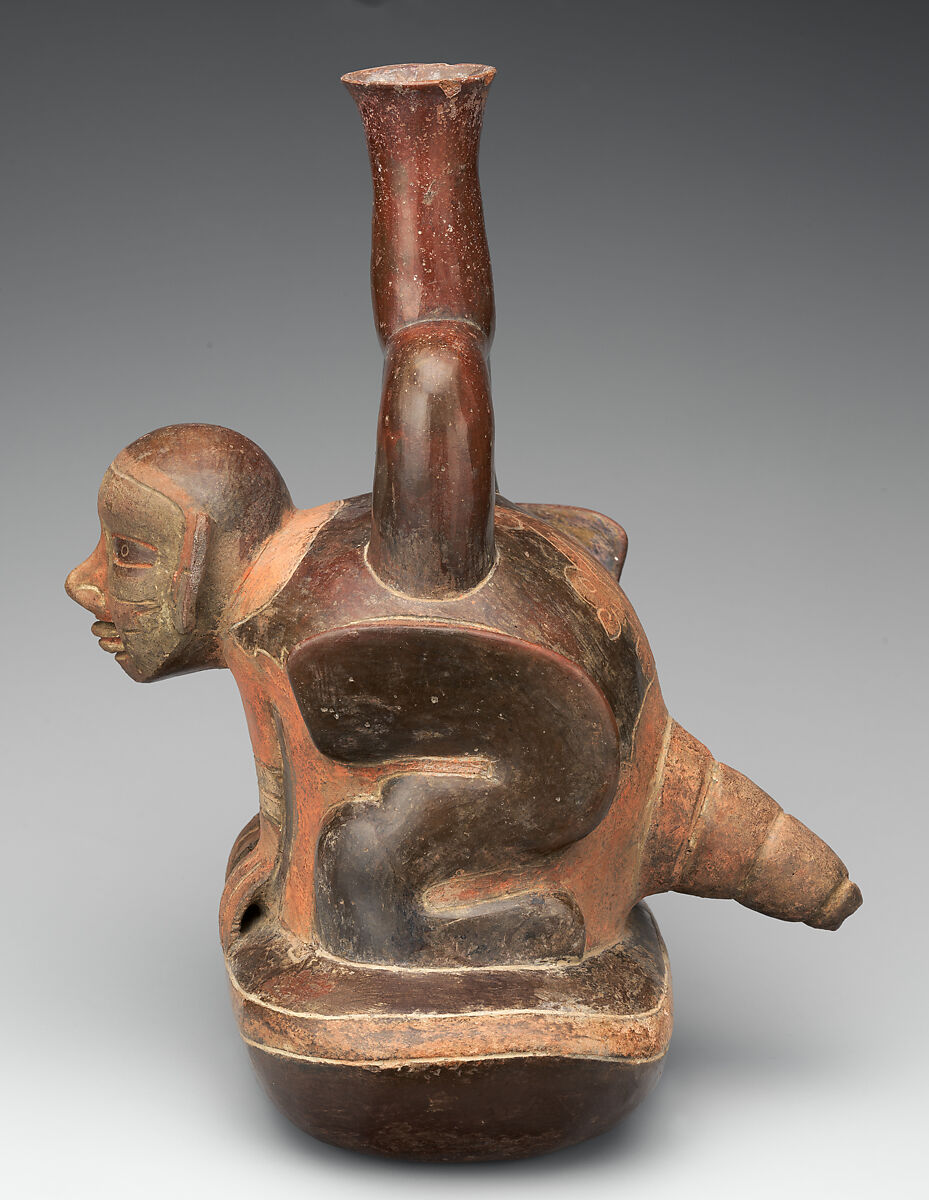 Stirrup-spout vessel with figure in a shell, Cupisnique artist(s), Ceramic, slip, post-fire paint, Cupisnique