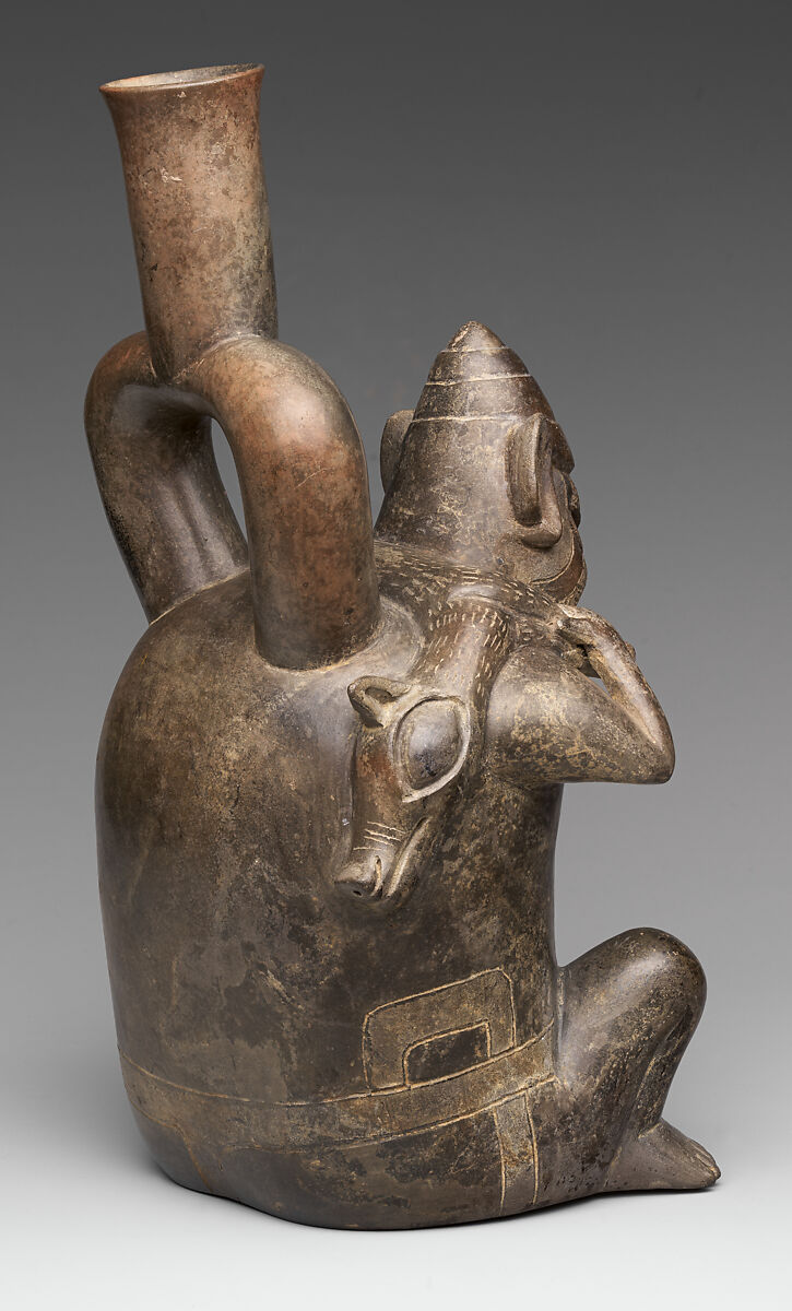 Stirrup-spout bottle with figure carrying deer, Cupisnique artist(s), Ceramic, Cupisnique