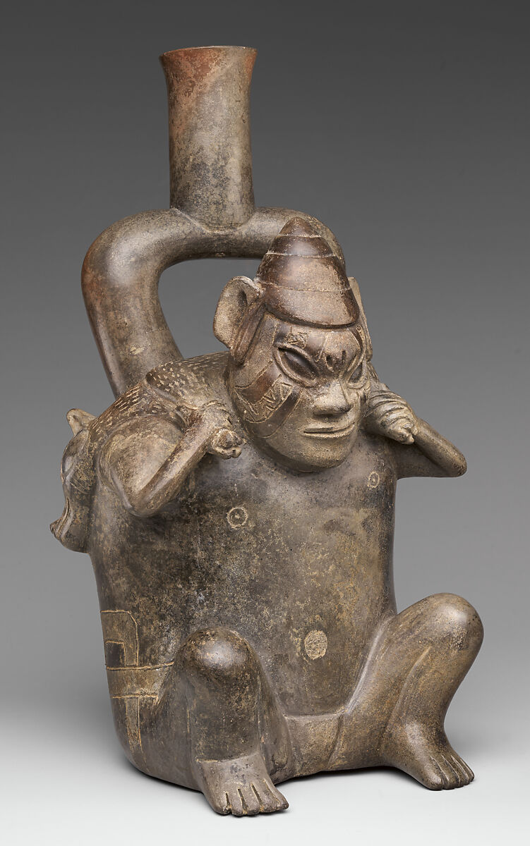 Stirrup-spout bottle with figure carrying deer, Cupisnique artist(s), Ceramic, Cupisnique 