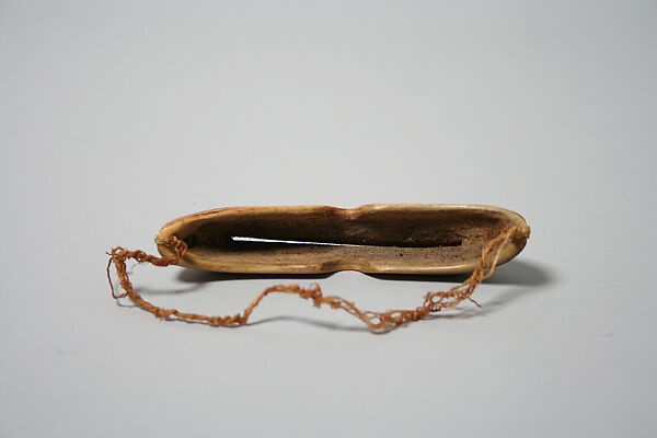 Child's Snow Goggles, Antler, pigment, sinew, Inuit