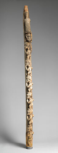 Palace pillar with male figures and leopard