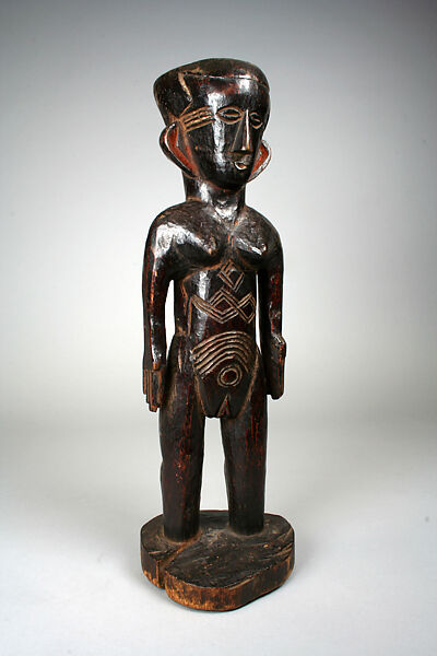 Figure: Female, Wood, camwood powder, Kuba peoples 