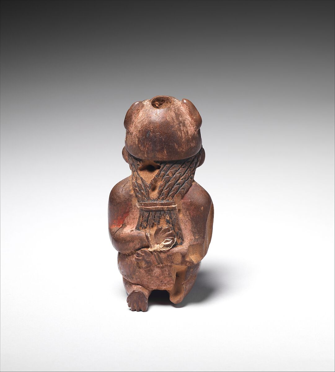 Lime container in the shape of a captive, Wari artist(s), Wood, animal bone, paint, fiber, Wari