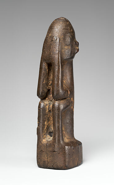 Seated Figure (Dyongou Serou), Wood, sacrificial materials, Dogon peoples